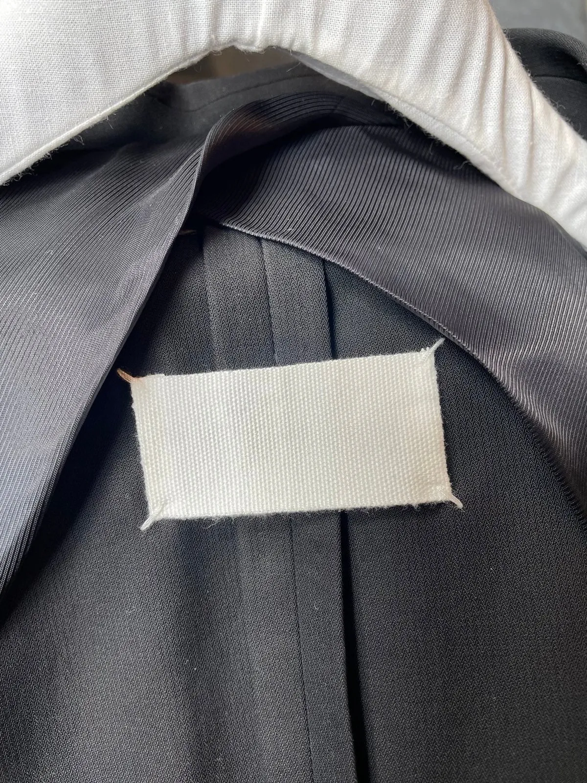 Maison Margiela black deconstructed padded shoulder cigarette jacket