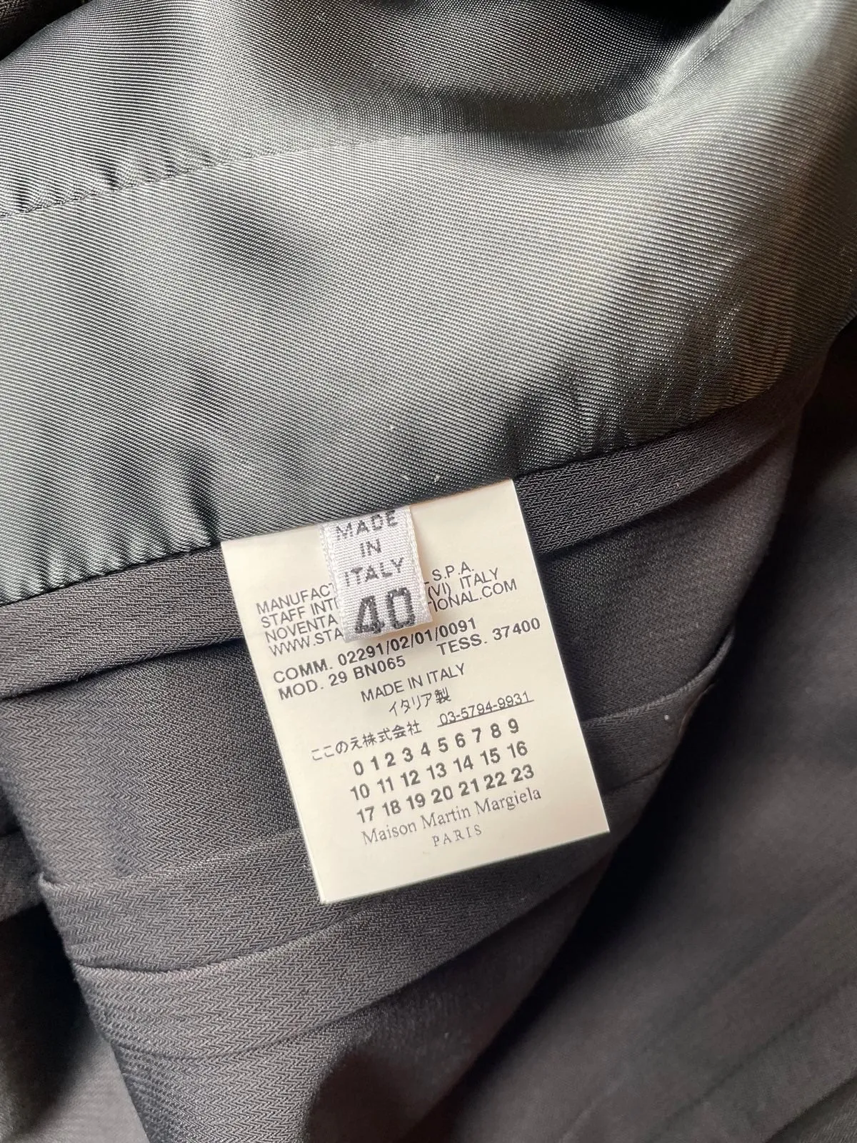 Maison Margiela black deconstructed padded shoulder cigarette jacket